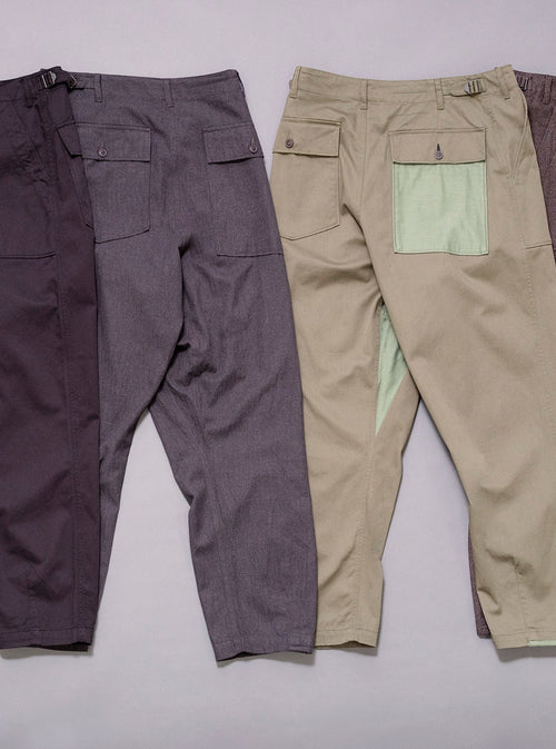 universal works drop crotch fatigue pant in black, charcoal, olive and brown
