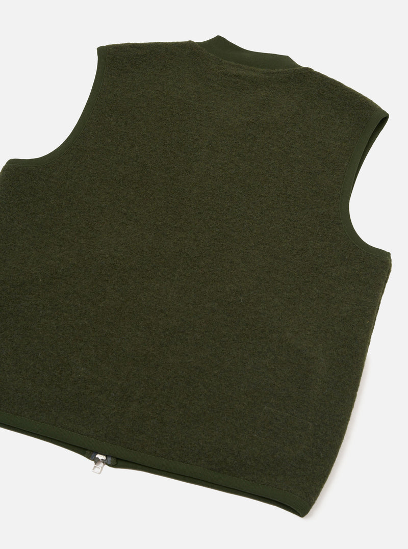 Rear view of the Olive Wool Fleece Zip Waistcoat presented against a plain white background. The back section highlights the soft olive green wool fleece texture, clean hemline, and simple sleeveless construction.