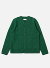 The Green Wool Fleece Cardigan, a button-up with patch pockets, is laid flat on a white background. The cardigan is a vibrant green and appears soft and warm.