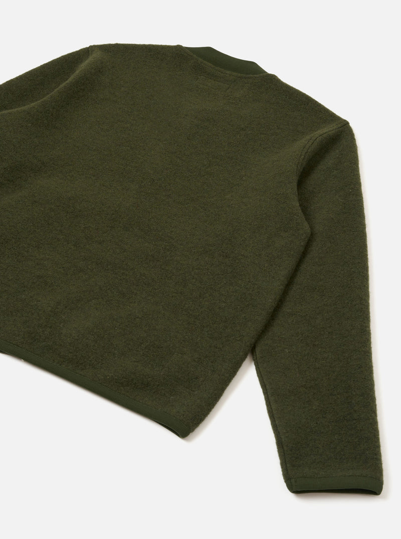 An angled top-down view shows the back of the Olive Wool Fleece Zip Bomber Jacket flat on a white surface. Displays dense brushed fleece fabric texture across the upper back and right sleeve, complemented by a ribbed hem and cuff.