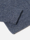 Close-up of the Slate Blue Wool Fleece Uniform Jacket sleeve on a white background, showcasing the material's texture.