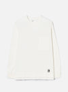 Ecru long-sleeve pocket tee in single jersey cotton, shot flat on a light grey seamless backdrop. Features a crew neck, one chest patch pocket, and ribbed cuffs. A Universal Works woven label sits at the interior neck and a small branded UW tab is stitched at the lower hem.