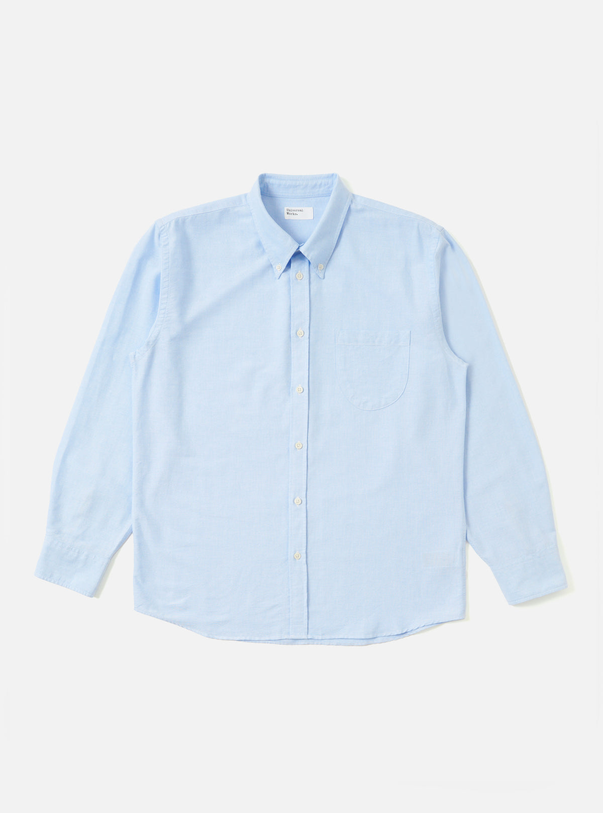 The Sky Blue Oxford Daybrook Shirt is displayed on a white background. The long-sleeved shirt is buttoned and features a chest pocket. The light blue color is soft and the oxford material looks crisp.