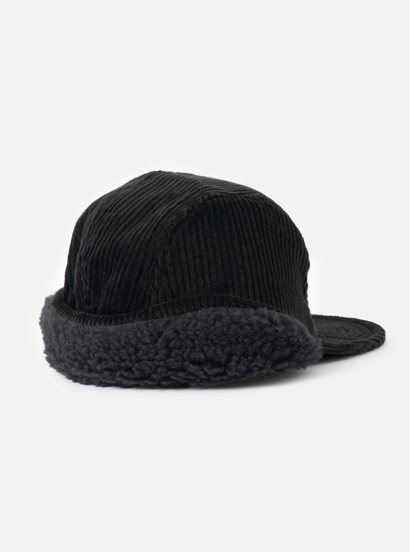 cableami® Black Corduroy 5w Cap on a white backdrop. The cap features a corduroy texture and a furry trim, offering a snug fit.