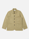 The Sand Twill Bakers Jacket, a light brown cotton jacket with button closure and patch pockets, is laid flat on a white background.