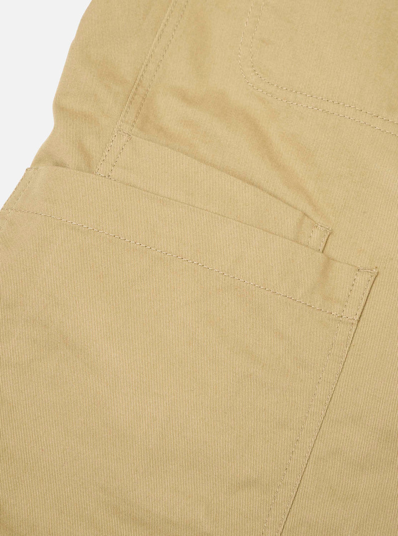 Interior close-up view of the Sand Twill Bakers Chore Jacket against a white background. Demonstrates the inner chest pocket, unlined cotton twill finishing, and clean internal seam stitching details.