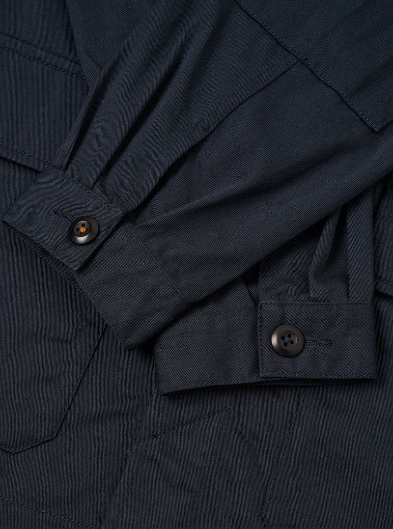 Internal view of the Navy Twill MW Fatigue Jacket against a white background. Shows the unlined cotton twill interior, waist drawstring adjustment channels, and internal pocket detail clearly.
