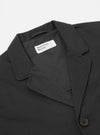 Close-up of a Black Twill Three Button Jacket on a white background. The jacket shows the collar, lapel, and a button. The fabric has a subtle twill texture.