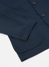 Close-up of the Navy Twill Three Button Jacket showing the sleeve and pocket detail. The jacket is on a white surface.