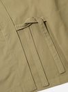 Close-up of the sand twill Kyoto Work Jacket, showcasing the twill texture and tie detail. The jacket is laid flat on a white surface.