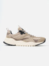 Side view of the Flower Mountain Dove Hairy Velour/Suede Wave Man sneaker. It's a beige shoe with suede and velour details, set against a white background.