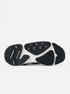 Close-up of the sole of a Flower Mountain Light Grey/Dark Grey Suede/Nylon Wave Man shoe on a white background. The sole is black and white with a geometric pattern.