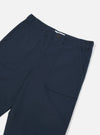 Close-up of the Navy Twill Fatigue Pant on a white background. The pants are a dark navy color and have a classic, relaxed fit. The twill fabric has a subtle texture.