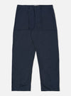 Studio shot of the Navy Twill Fatigue Pant on a white background. The pants are a dark navy color and made of twill. They have a relaxed fit.