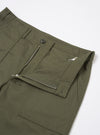 Green pants with a zipper pocket on a white background