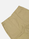 Close-up of the Sand Twill Fatigue Pant on a white background. The sand-colored twill material shows the details of the pockets, seams, and button closure.