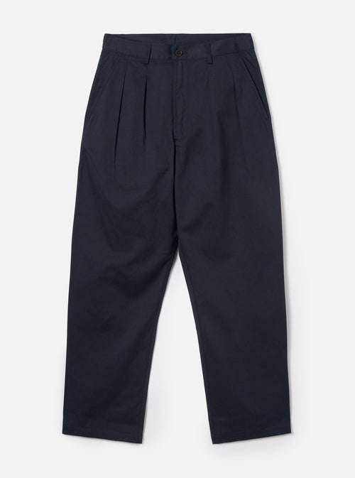 Front view of the Navy Twill Double Pleat Pant presented on a plain white backdrop. Displays front double pleats, wide relaxed legs, side hand pockets, and deep navy cotton twill tailoring.