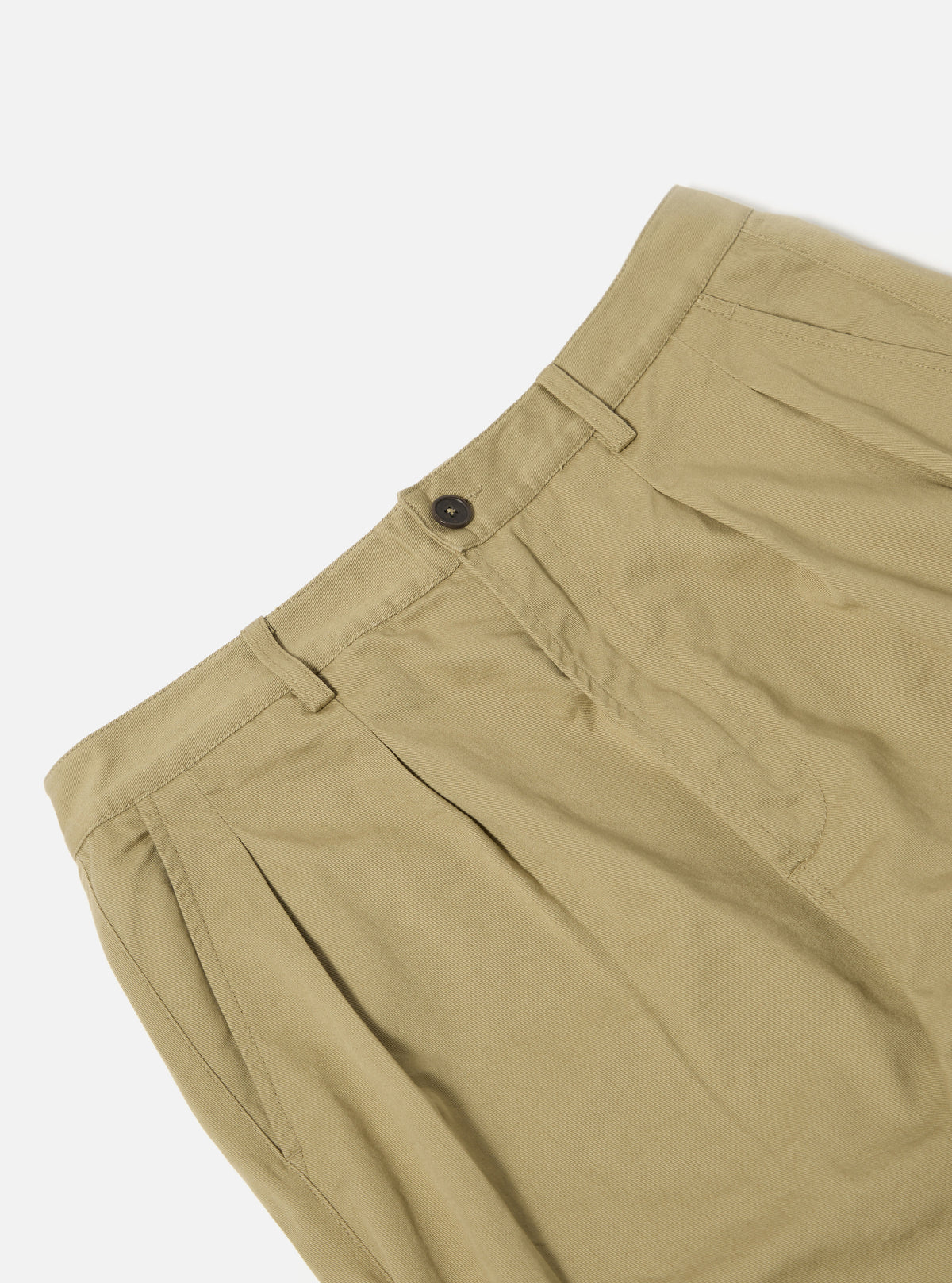 Close-up of the Sand Twill Double Pleat Pant on a white background, showing the double pleats, button closure, and twill texture.