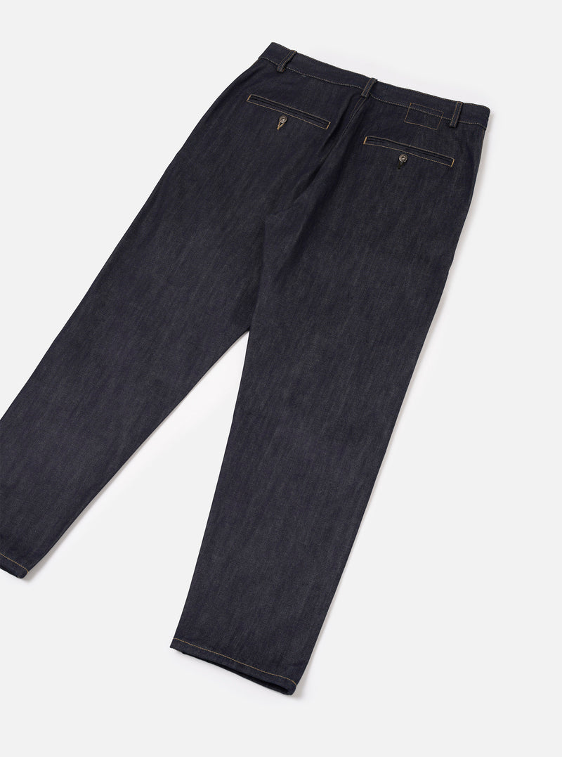 Rear view of the Indigo 13oz Selvedge Denim Military Chino against a neutral background. Focuses on the clean back tailoring, tailored seat, rear pockets, and heavy indigo-dyed selvedge denim material with detailed stitching.