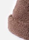 Close-up of the cableami® Brown Toque Boa Cap, showcasing its soft, textured material. The image is set against a clean white background.