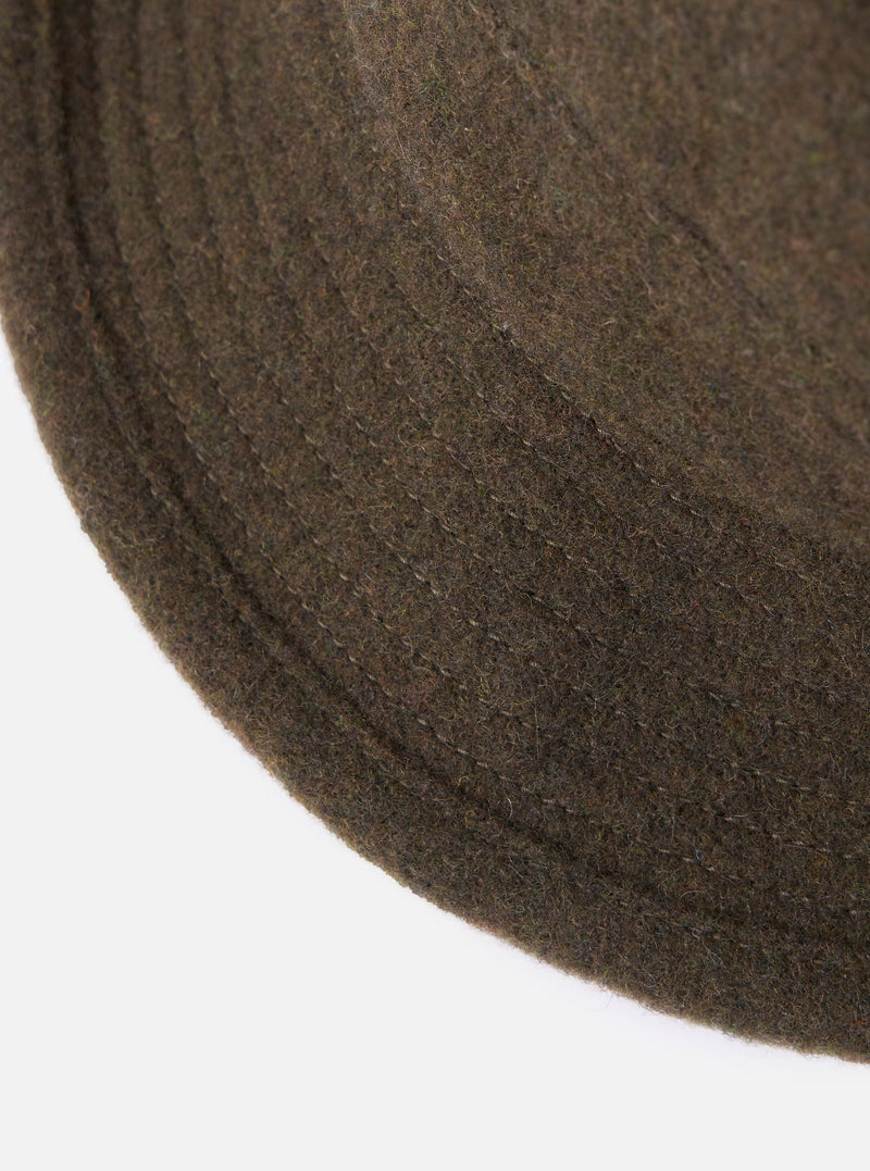 Close-up of the cableami® Olive Recycled Wool Army Hat on a white background. The olive green wool texture is visible.