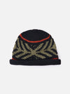 cableami® Black Wool Jacquard Watch Cap on a white background. The cap features a black base with a green jacquard pattern and a red stripe.  Warm and stylish.