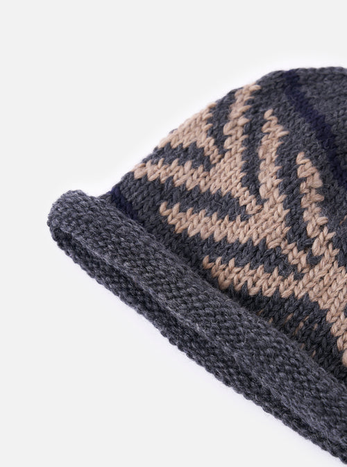 Close-up of a cableami® Grey Wool Jacquard Watch Cap on a white background. The cap features a grey and beige patterned knit.