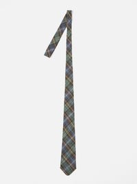 The Green Ikat Twill Check Tie is displayed on a white background. The tie features a green, blue, and gold check pattern.