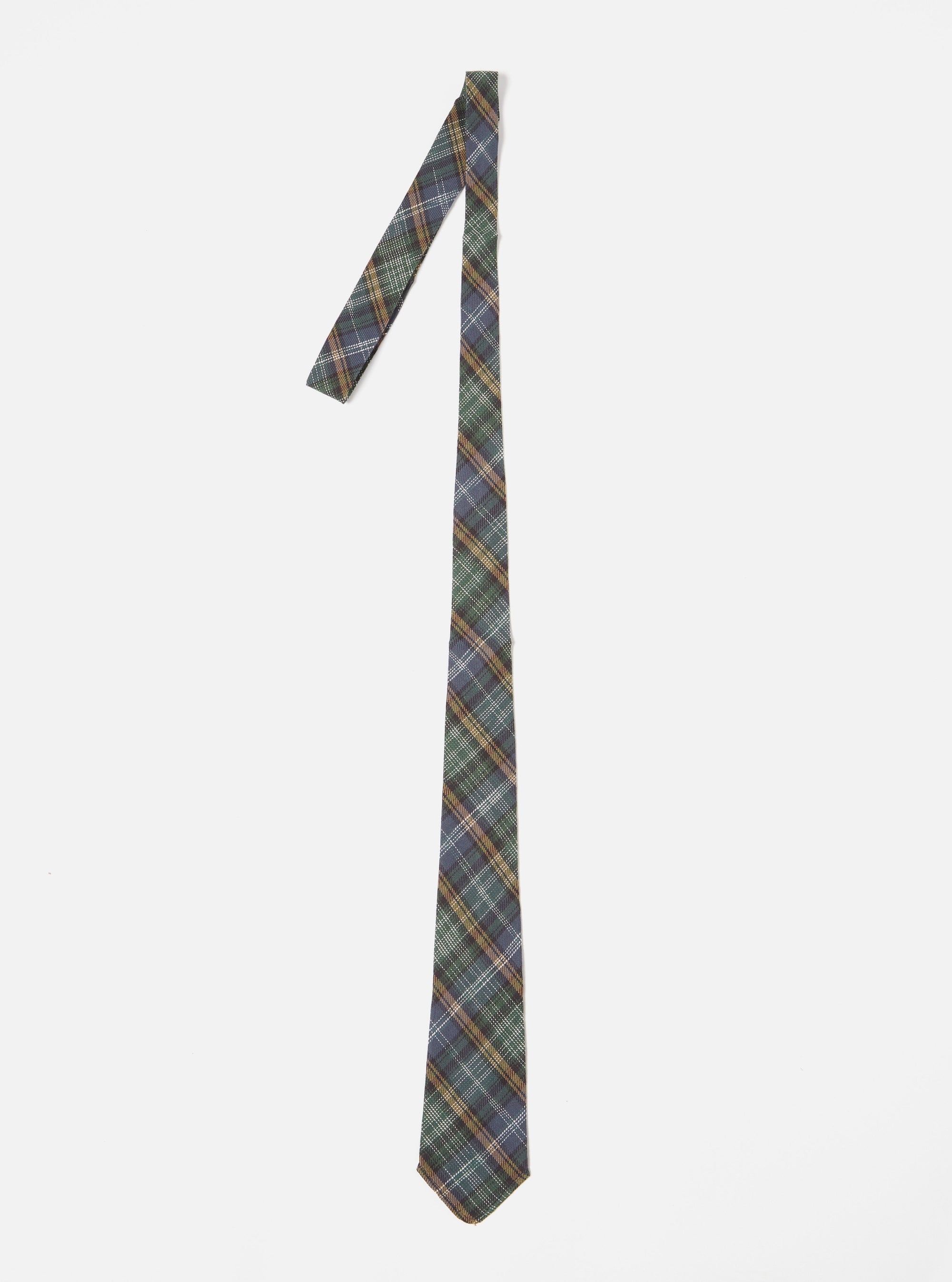 The Green Ikat Twill Check Tie is displayed on a white background. The tie features a green, blue, and gold check pattern.