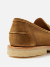 Close-up of the heel of a Sanders for Universal Works Tobacco Suede Edwin Loafer on a white background. The tobacco-colored suede and layered sole are clearly visible.