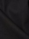Close-up of the Black Twill Fatigue Pant (Undarted), showcasing the fabric's texture and dark color. The image is tightly cropped, highlighting the twill weave against a plain background.