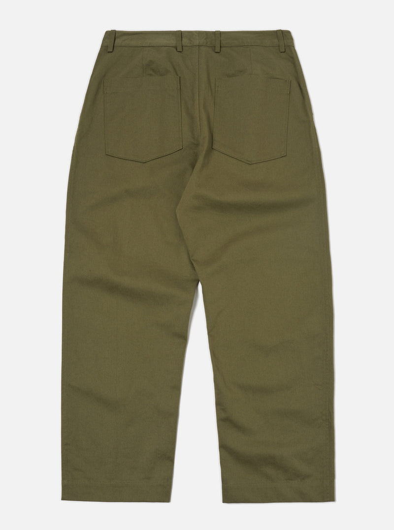 The Light Olive Twill Duke Pant laid flat on a white background. The pants are a light olive green color and made of twill fabric. They have a relaxed fit.