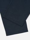 Close-up of the Navy Twill Duke Pant on a white surface. The twill fabric shows a subtle texture and a clean, tailored fit.