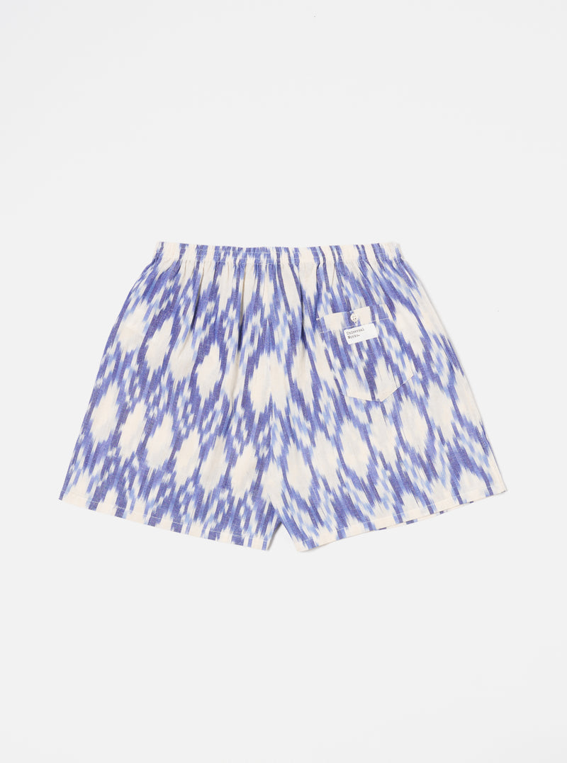 The Ecru Ikat I Cotton Boxer Short on a white background. The shorts are ecru with a blue ikat pattern and have an elastic waistband.