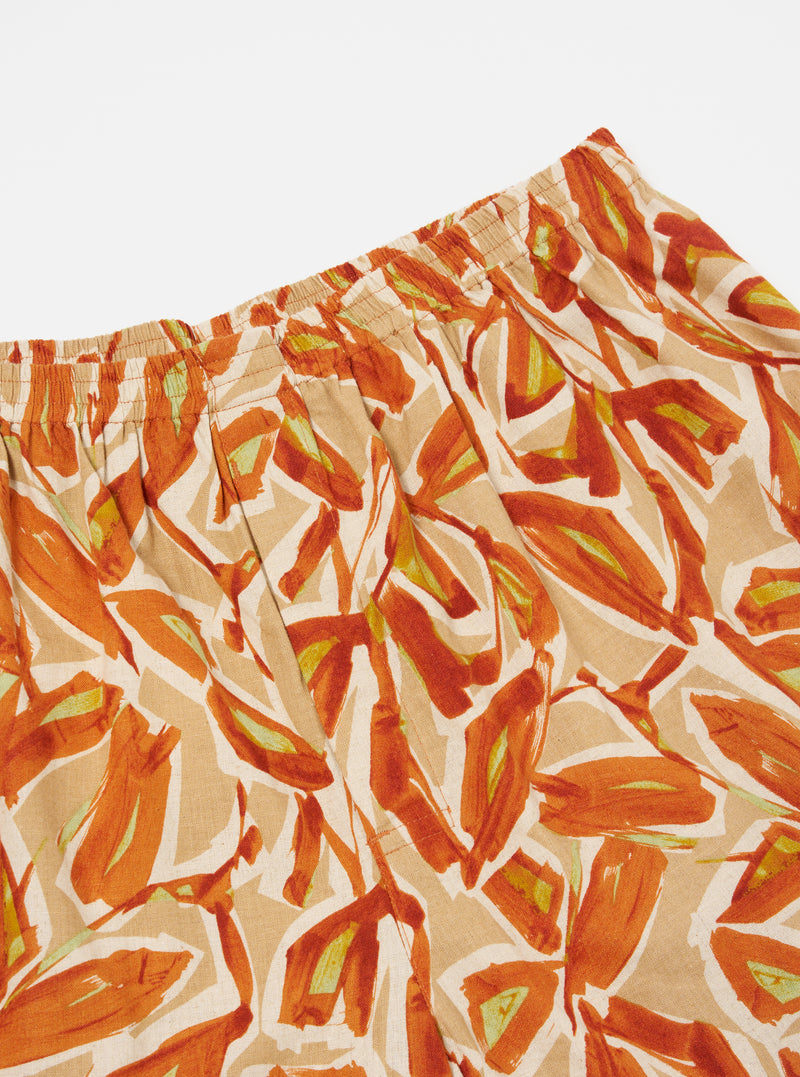 Close-up of the Terracotta Artist Flower Lincot Boxer Short on a white background. The shorts feature a terracotta and beige floral print with a comfortable elastic waistband.