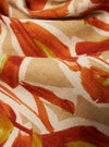 Close-up of the Terracotta Artist Flower Lincot Boxer Short fabric. The material has a floral pattern with terracotta, beige, and white hues. The fabric is folded.
