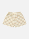 The Ecru PJ Plaid Boxer Short, in a cream and tan plaid, is laid on a white background. The shorts have an elastic waist.