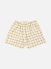 The Ecru PJ Plaid Boxer Short on a white background. The shorts are ecru with brown and navy plaid. They have an elastic waistband and a relaxed fit.