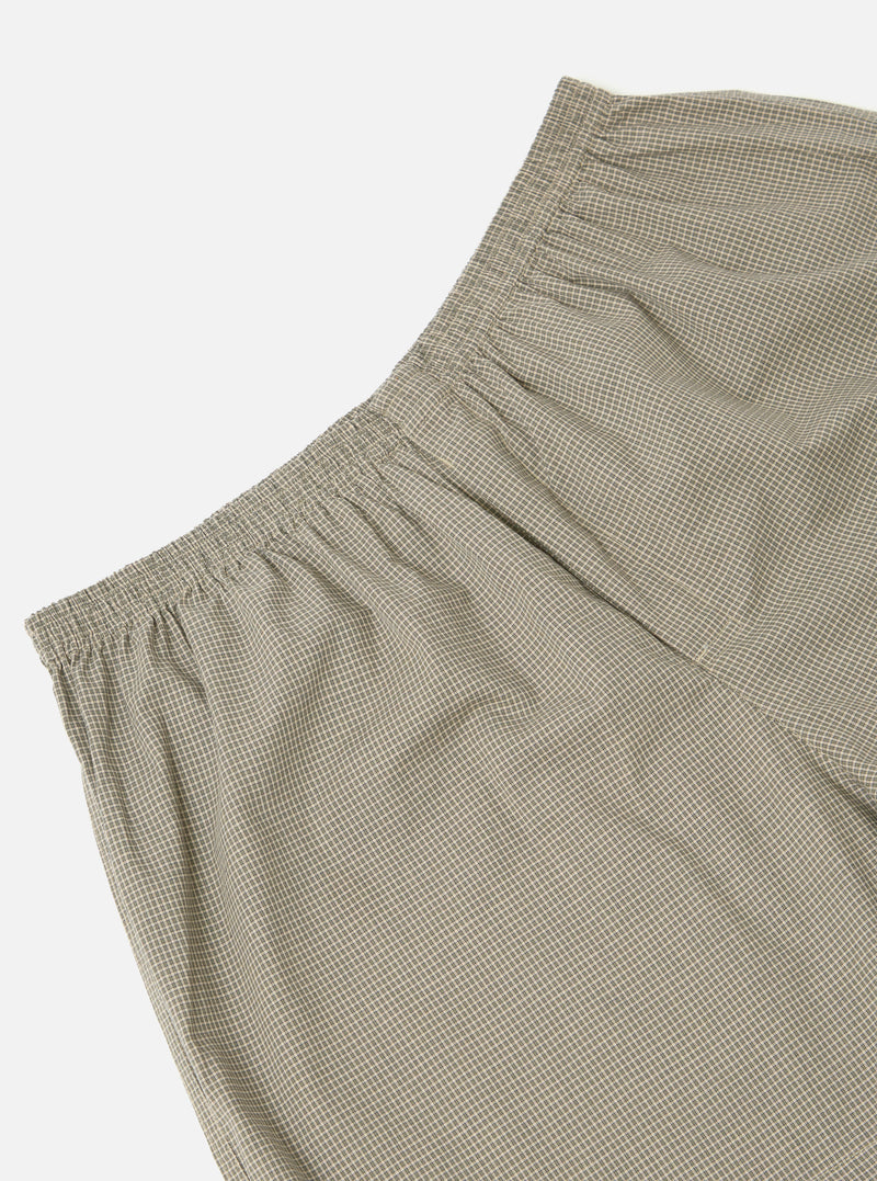Close-up of Green Tiny Check Boxer Short on a white background. The boxer short features a small green and white check pattern and an elastic waistband.