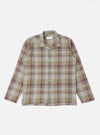 The Green Kip Check Long Pyjama Set top, laid flat on a white background. The top is a relaxed fit with a green, red, and blue check pattern.