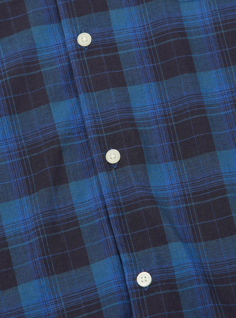 Close-up of the Navy/Blue Check Long Pyjama Set. The fabric is a soft-looking cotton blend with a classic check pattern. White buttons are visible. Shot on a flat surface.