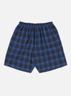 Close-up of the Navy/Blue Check Short Pyjama Set. The shorts are laid flat on a white background. The fabric is a blue and navy check pattern with an elasticated waist.