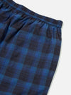 Close-up of the Navy/Blue Check Short Pyjama Set. Features a blue and navy check pattern, elasticated waist, and pocket. Shot on a white background.