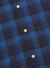Close-up of the Navy/Blue Check Short Pyjama Set. The fabric features a blue and navy check pattern with white buttons. The image is tightly cropped.