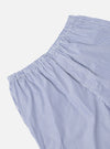 Close up of the Navy Classic Stripe Short Pyjama Set. The shorts are blue and white striped with an elastic waist. Shot on a white background.