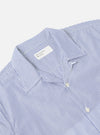 Close up of the Navy Classic Stripe Short Pyjama Set top. The blue and white striped shirt is on a white background.