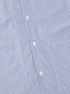 Close-up of the Navy Classic Stripe Short Pyjama Set. The blue and white striped cotton fabric features a button-down front and chest pockets. The image is shot on a flat surface.