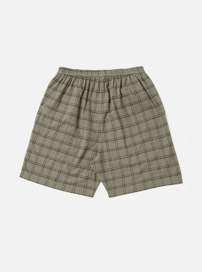 The Green PJ Plaid Pyjama Short on a white background. The shorts are a loose fit with an elastic waistband and a green and brown plaid pattern.
