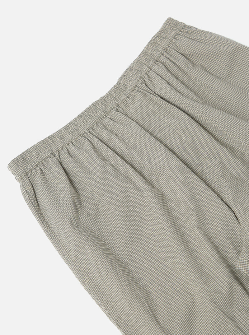 Close-up of the Green Tiny Check Pyjama Pant, showcasing its elastic waistband and soft, checkered fabric on a clean, white background.