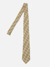 The Sand Picnic Plaid Tie on a white background. The tie has a tan, gold, black, and white plaid pattern.